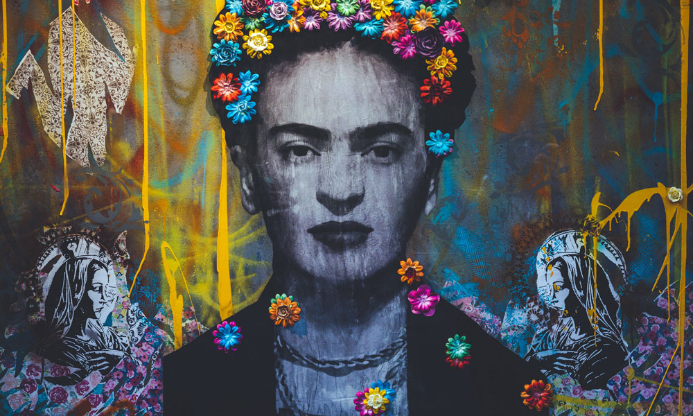 Graffiti art of Frida Kahlo with flowers in her hair